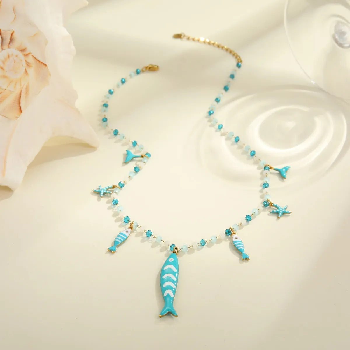 Women's stainless steel coloured beaded necklace with fish pendant in pink, 18K electroplated, adjustable 41-50cm