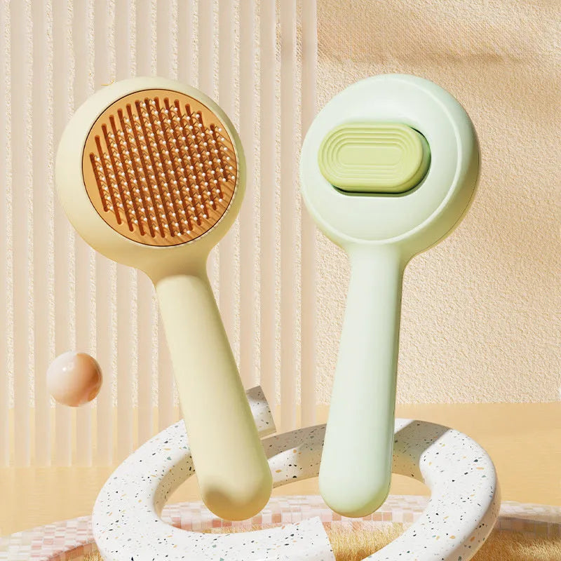 Stainless steel cat grooming brush with non-slip handle in green and yellow colour options