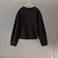 Women's polar fleece two-piece suit with O-neck pleated top and wide-leg trousers in black colour