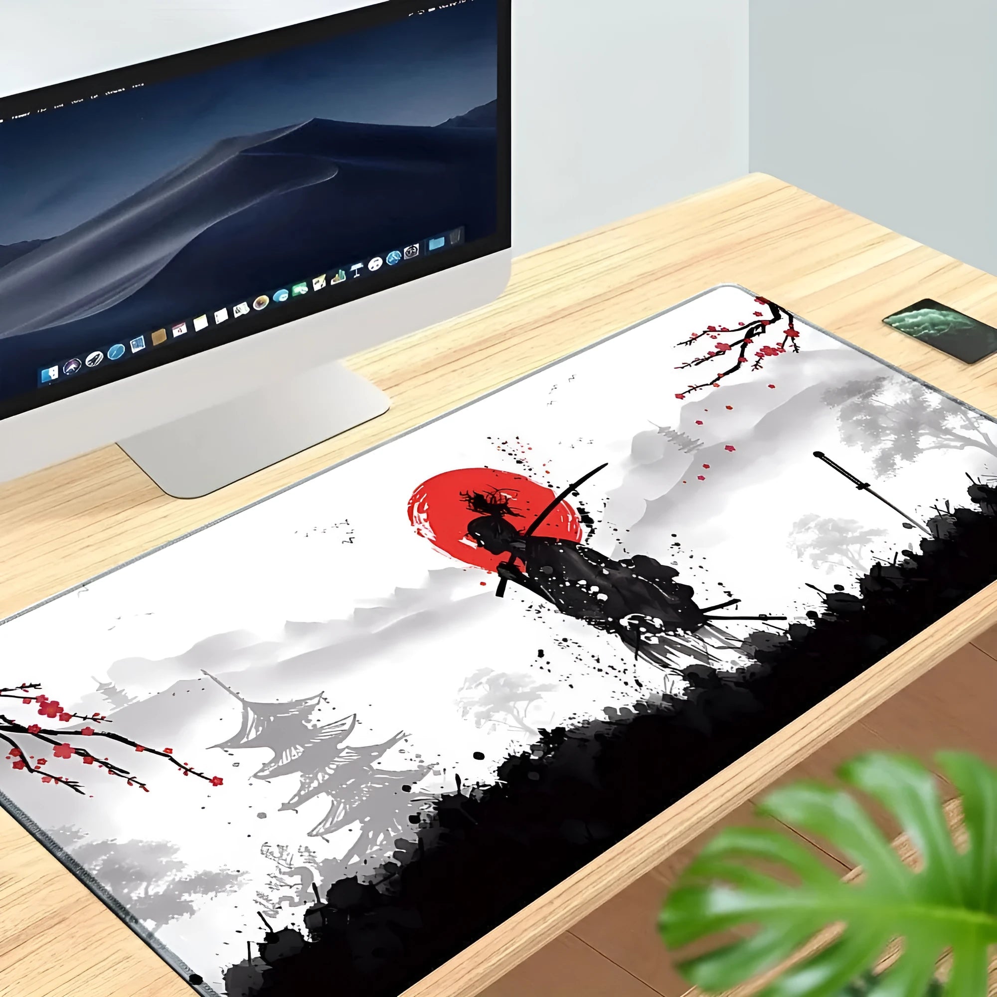 Large black cloth gaming mouse pad with detailed Japanese samurai warrior artwork print.