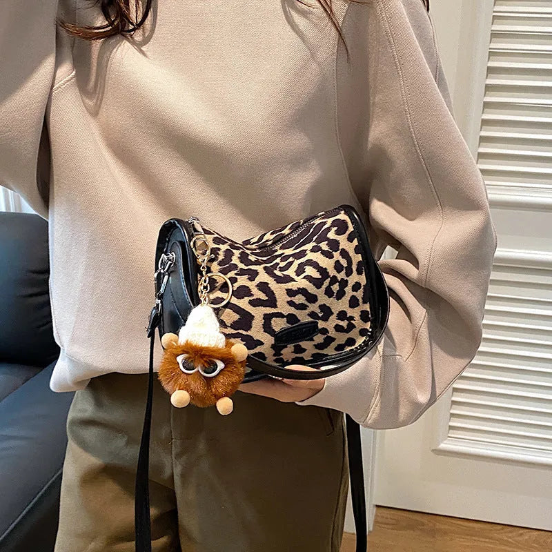 Horizontal square PU messenger bag with leopard print colour option and pendant detail