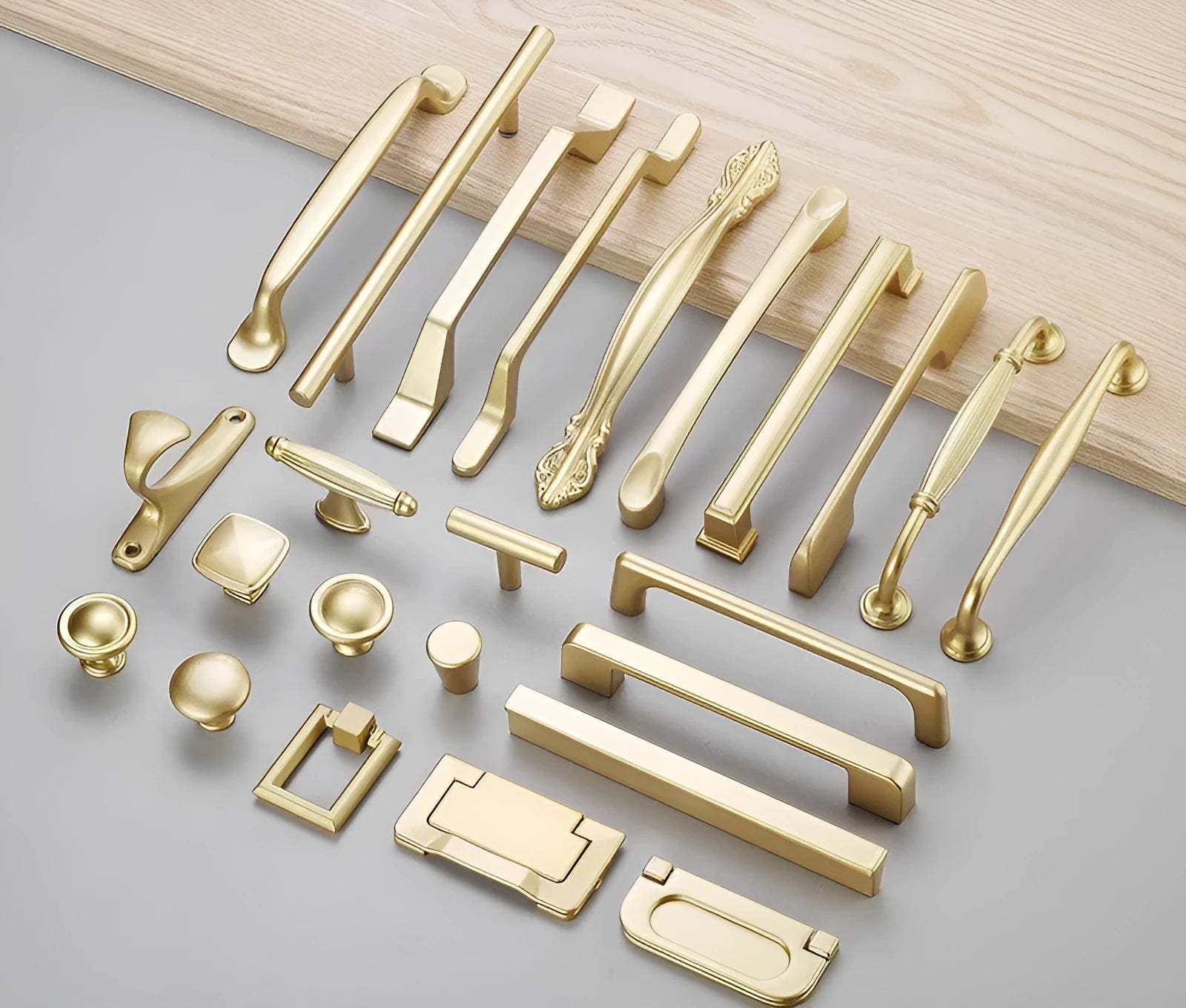 Gold coloured aluminium T-shape single hole cabinet handle and drawer pull