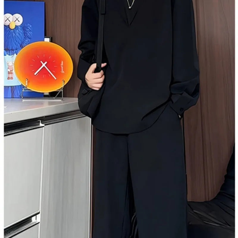 Men's black casual two-piece suit with long sleeve polo shirt and trousers in slim fit design