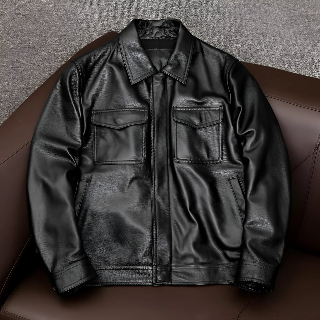 A loose-fit men's black PU leather lapel jacket with a side pocket, shown on a model.