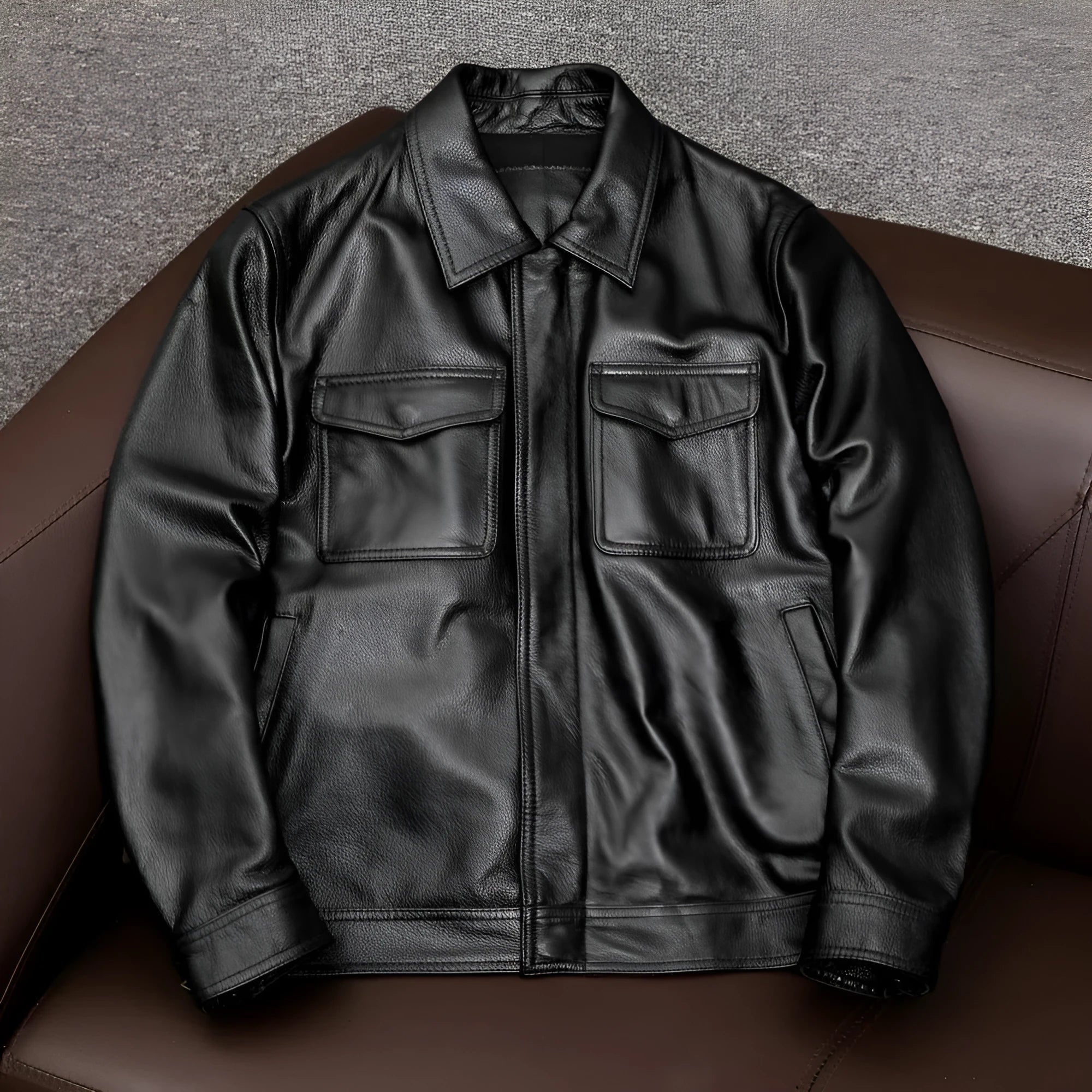 A loose-fit men's black PU leather lapel jacket with a side pocket, shown on a model.