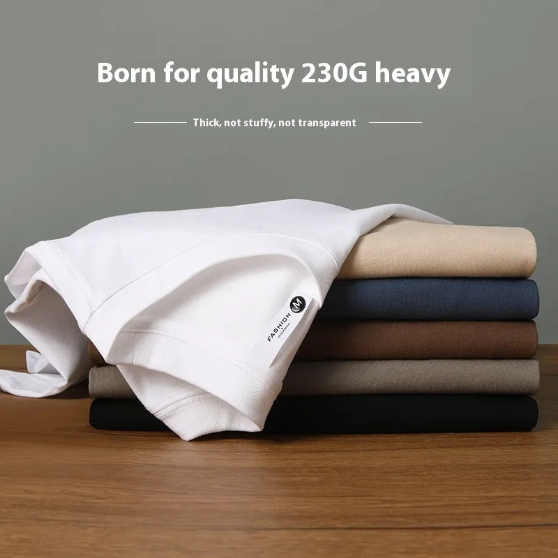 Man wearing a heavyweight apricot coloured drop shoulder loose fit t-shirt for casual wear.