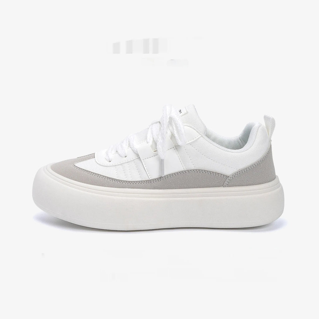 Men's black canvas platform lace-up trainers with a raised heel on a white background
