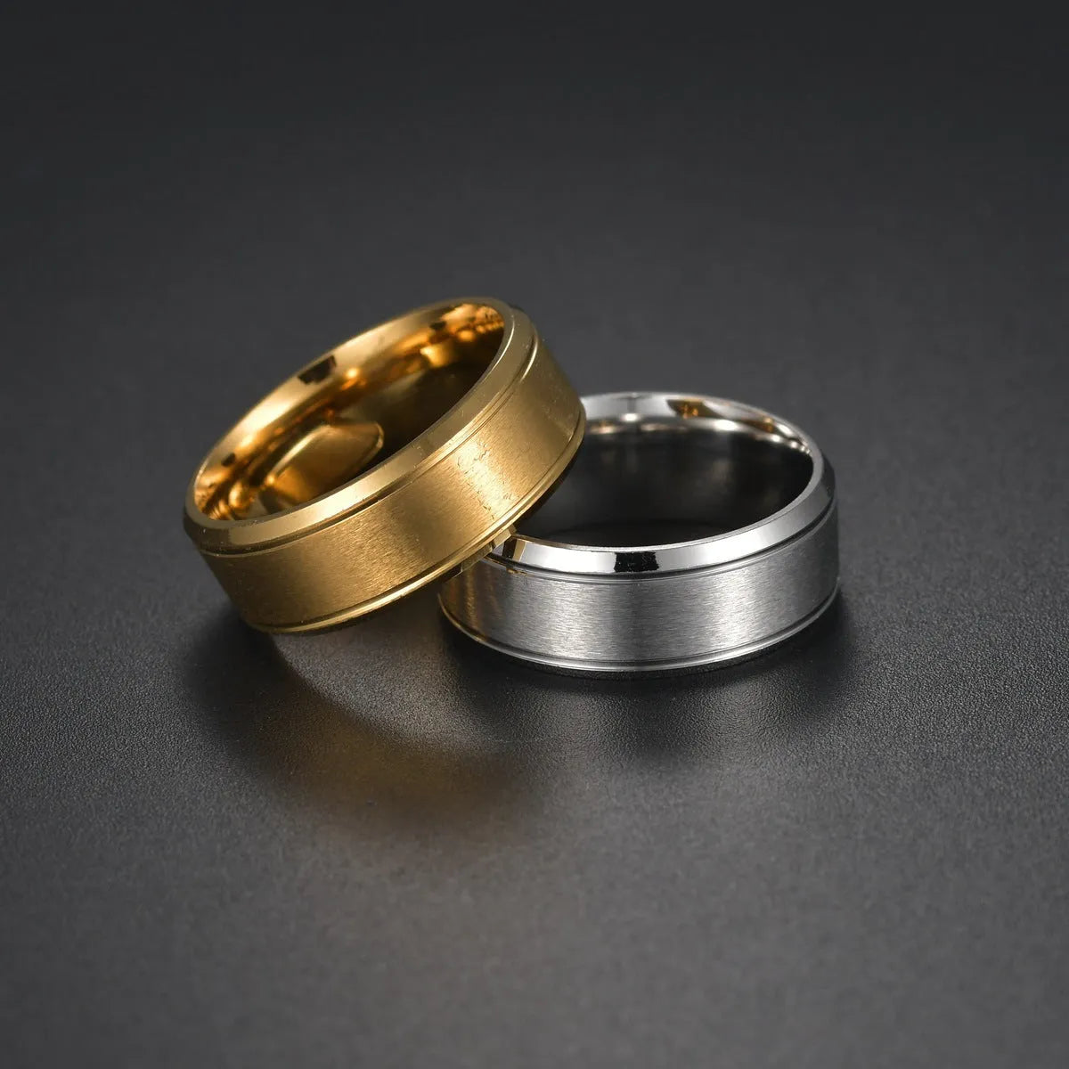 8mm stainless steel unisex ring with geometric circle design in black, gold or silver, sizes 5 to 14