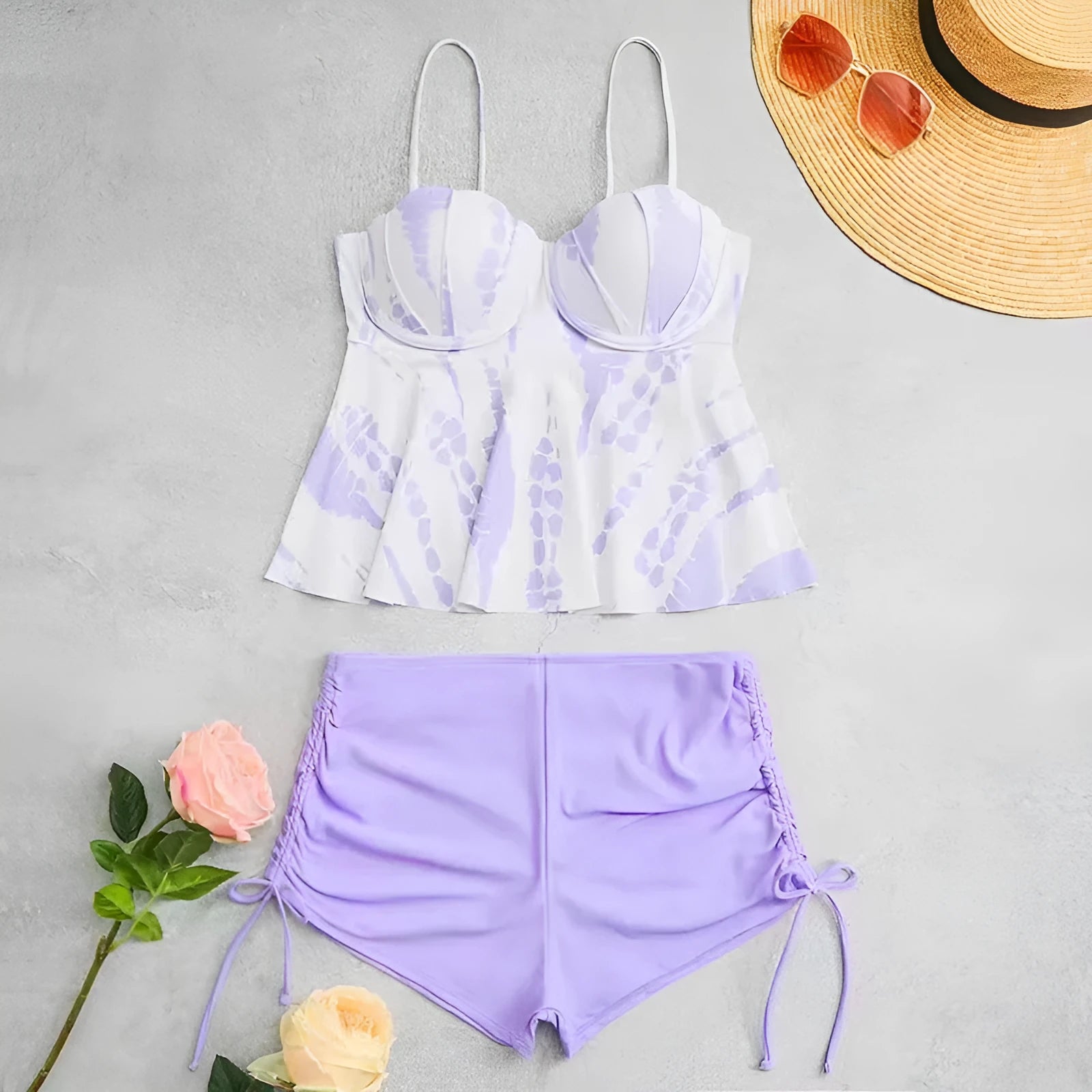 Women's geometric print split bikini swimsuit in blue, shown as a top and shorts set.