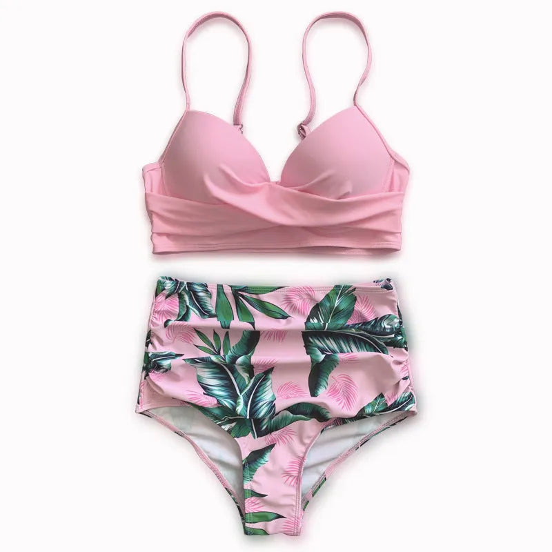 Women's yellow push-up bikini set with high-waisted briefs and a floral printed split design.