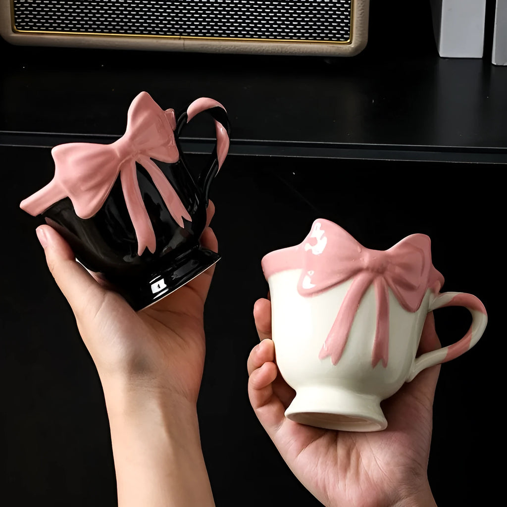 Ceramic mug with girl heart bow design in black pink or white powder colours, 301-400ml capacity