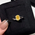 Women's yellow rock sugar crystal ring on copper band showing detail of crystal design