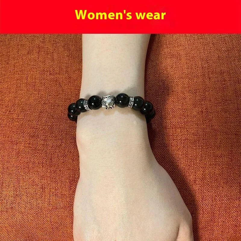 Natural obsidian bracelet with silver 999 clasp, showing cloud year pattern and lucky colour eye beads.
