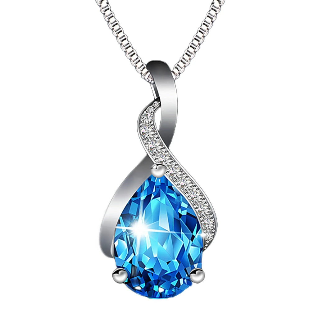 Copper drop shape pendant necklace with electroplated finish on a dark blue diamond square chain