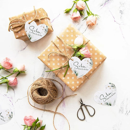 50 flower heart-shaped paper gift tags in decorative patterns with adhesive fold-over design