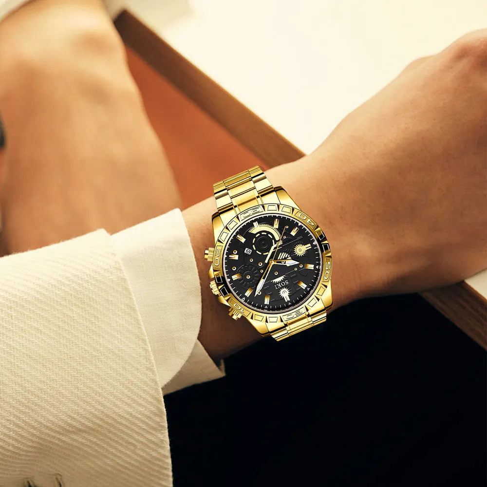 Gold men's business watch with steel strap showing calendar function and spiral crown
