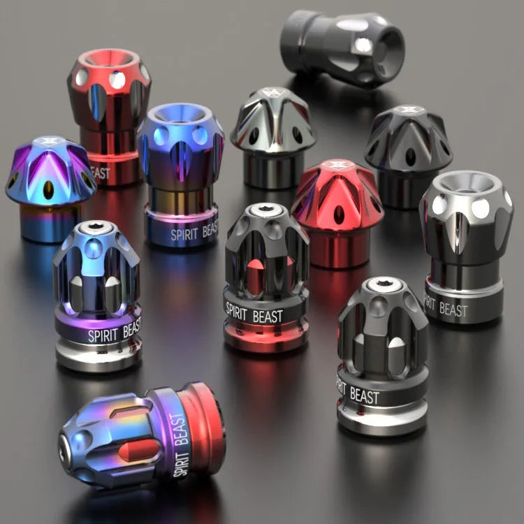 Pair of motorcycle tyre valve core caps in T6 aluminium alloy and 304 stainless steel, CNC machined, with oxidation colouring.