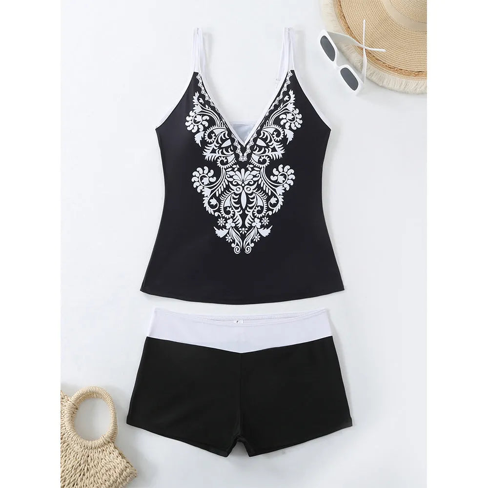 Plus size women's swimsuit set with brief-style top and matching swim shorts in black or rose red