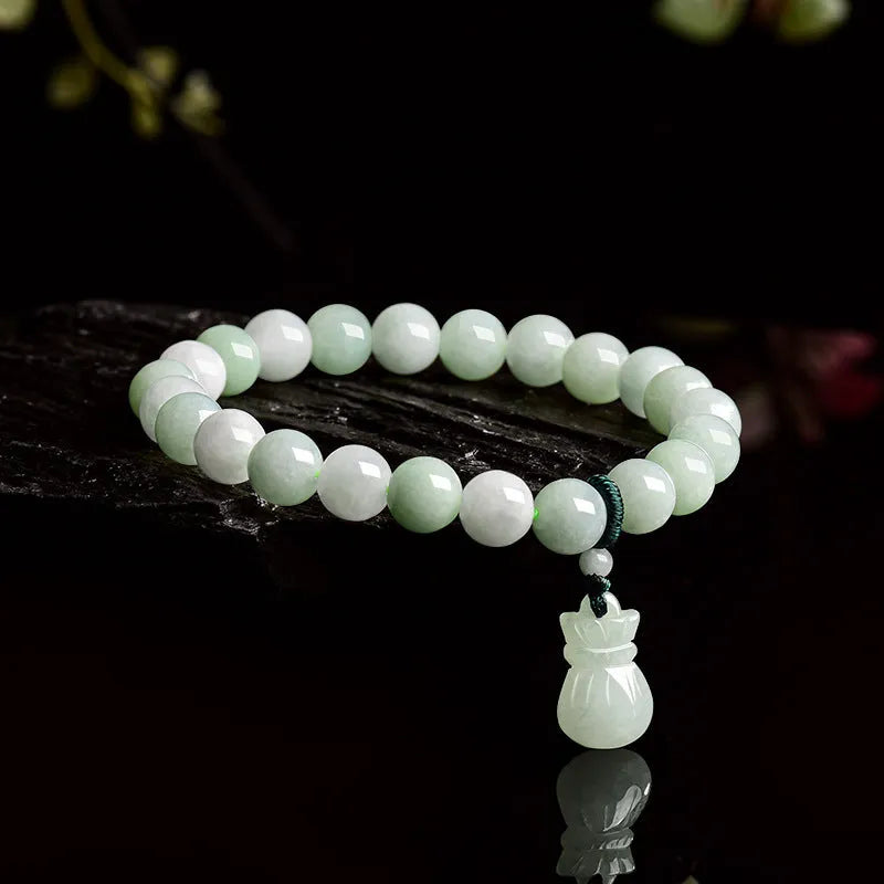 Jade purse bracelet with 8mm floral beads on wrist, traditional Chinese unisex design