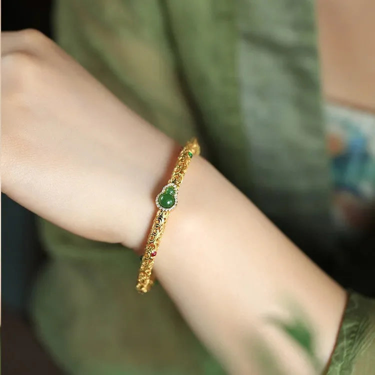 Gold-plated copper women's bracelet with retro opening xiangyun gourd charm in open style design