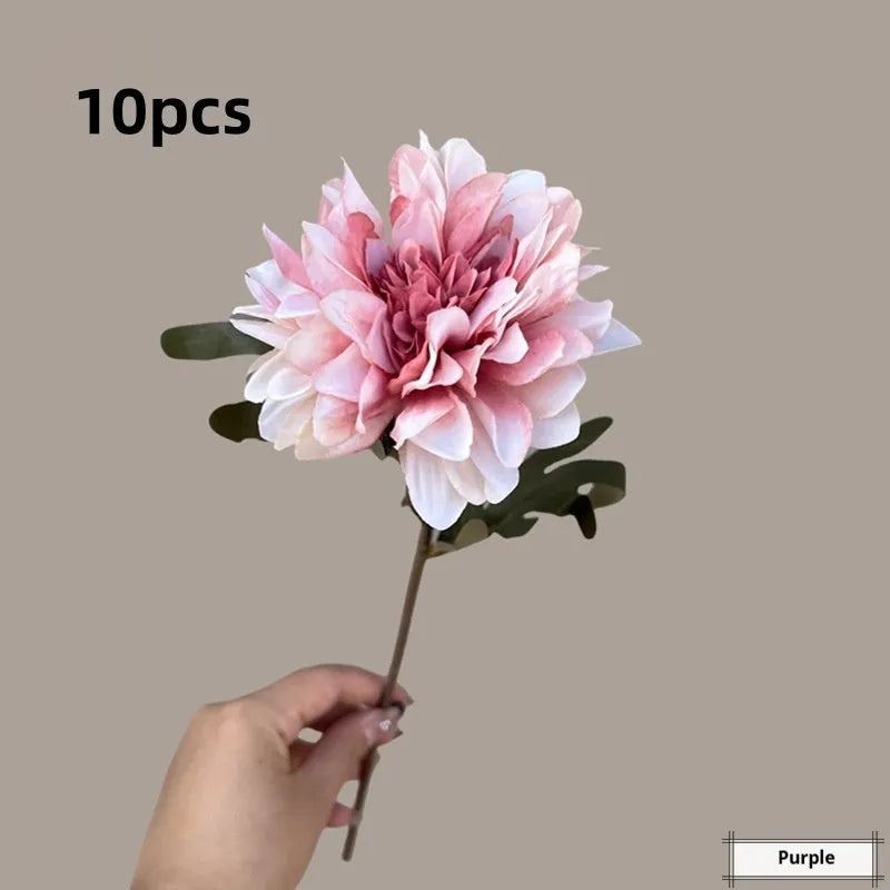 Artificial chrysanthemum with purple plastic and silk petals, 37cm tall, on a neutral background