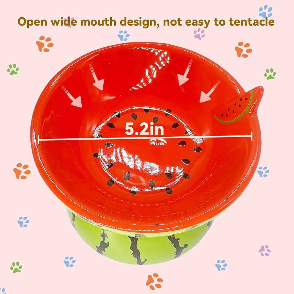 Ceramic elevated cat bowl with tilted wide dish in a colourful fruit pattern.