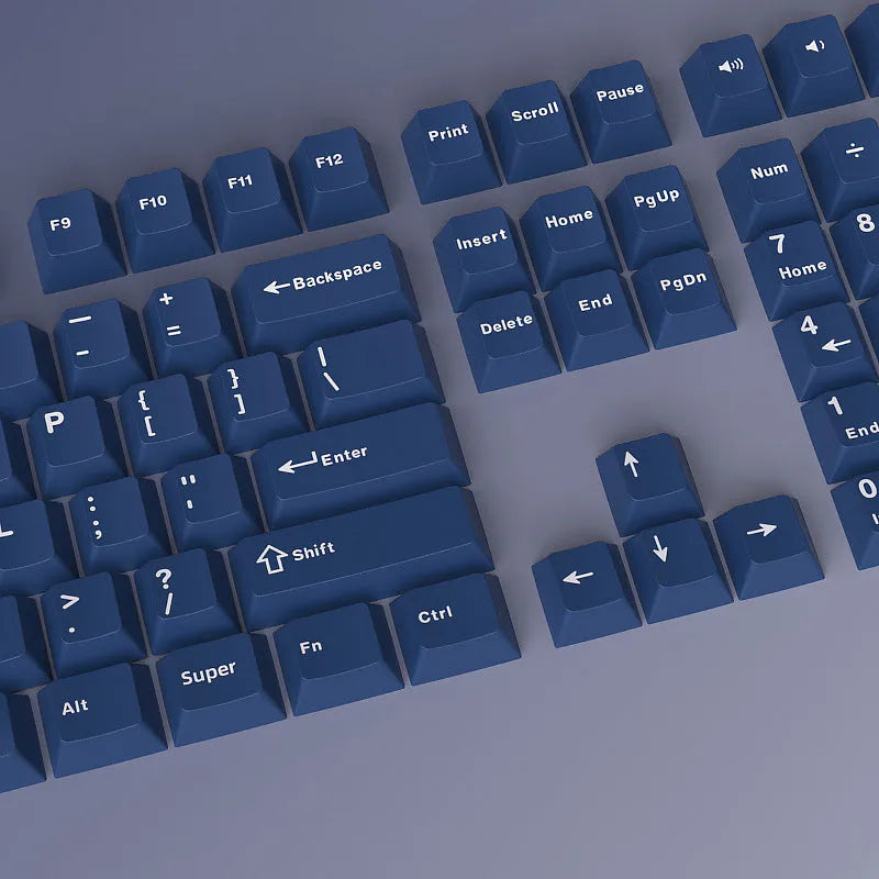 PBT two-tone blue key cap set with carved height profile, measuring 27cm x 17cm x 3cm
