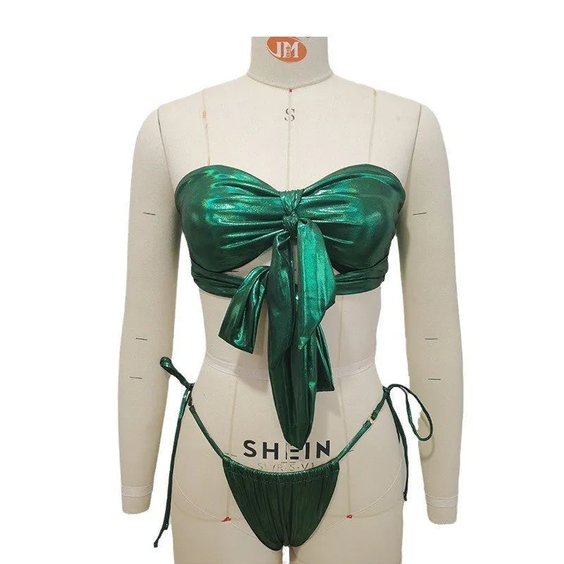 Women's lace-up front swimsuit with removable chest pad and split-leg cut in a floral print.