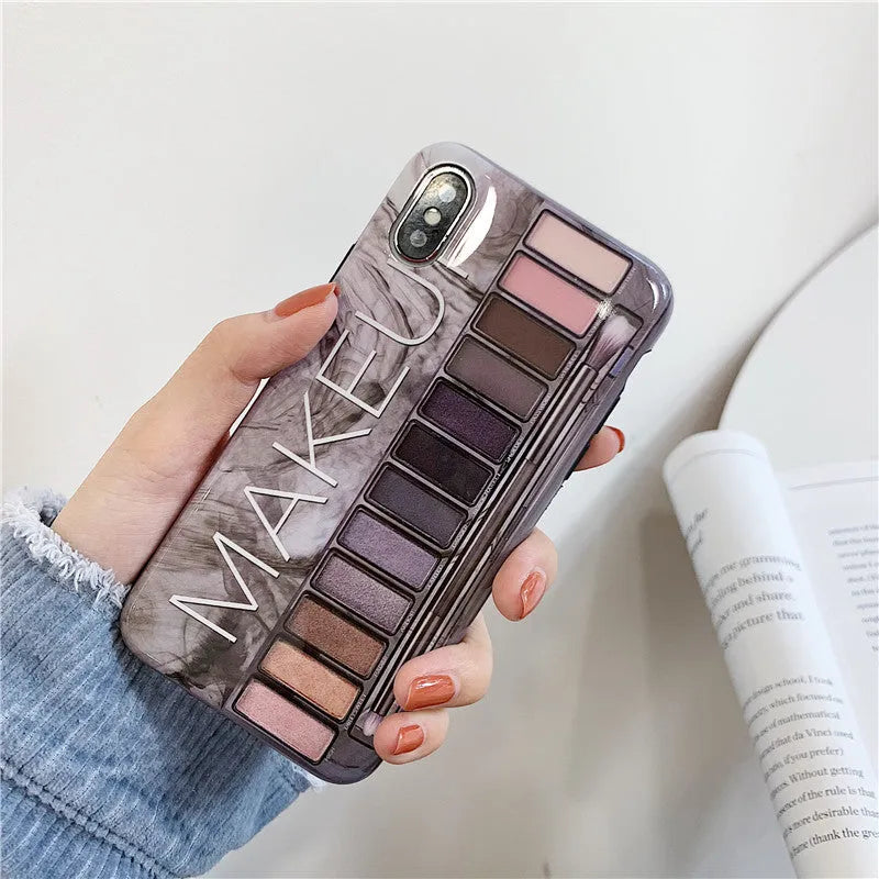 Silicone iPhone case with marble pattern in flesh or grey colour.