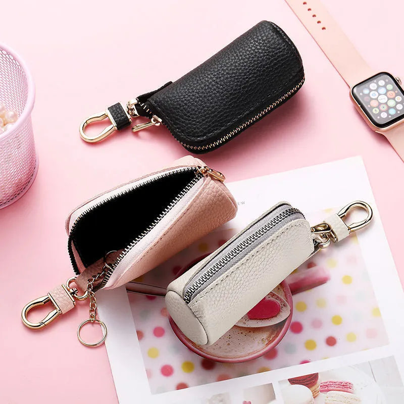 PU leather zipper key ring case in black, grey, and pink colours showing waterproof key organiser