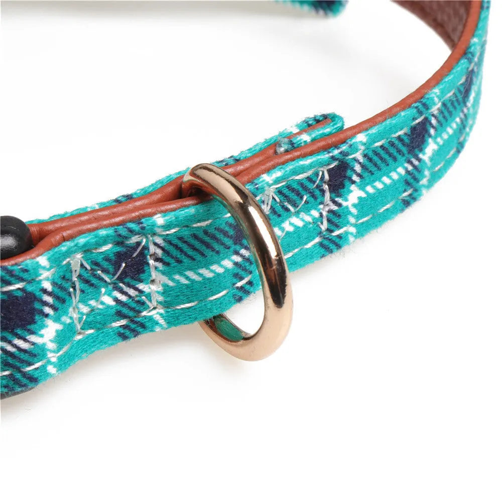 Adjustable bowknot traction dog collar in cotton and PU leather with lattice pattern on white background