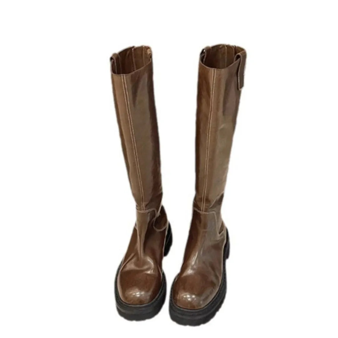 Women's black chunky heel knee-high knight boots with round toe and back zipper on a white background.
