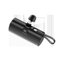Compact capsule‑shaped digital display power bank with integrated plug, shown in multiple colours.