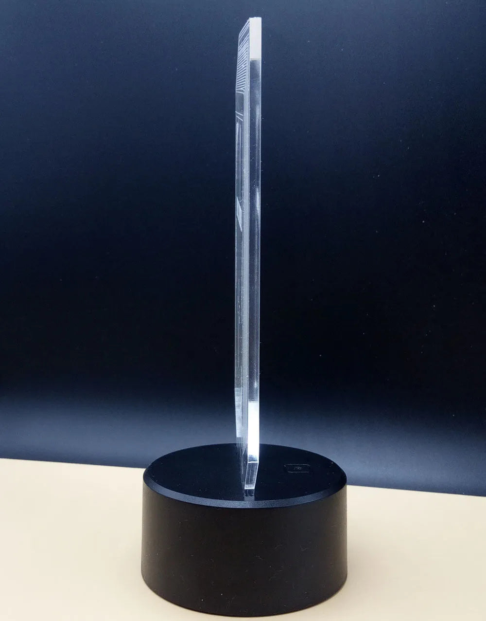 3D rose-shaped LED night light on a black base showing multiple colour options