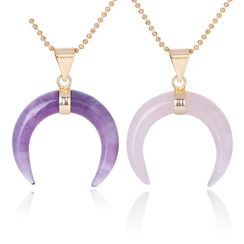 Natural crystal stone moon pendant necklace on an adjustable chain with copper fittings.