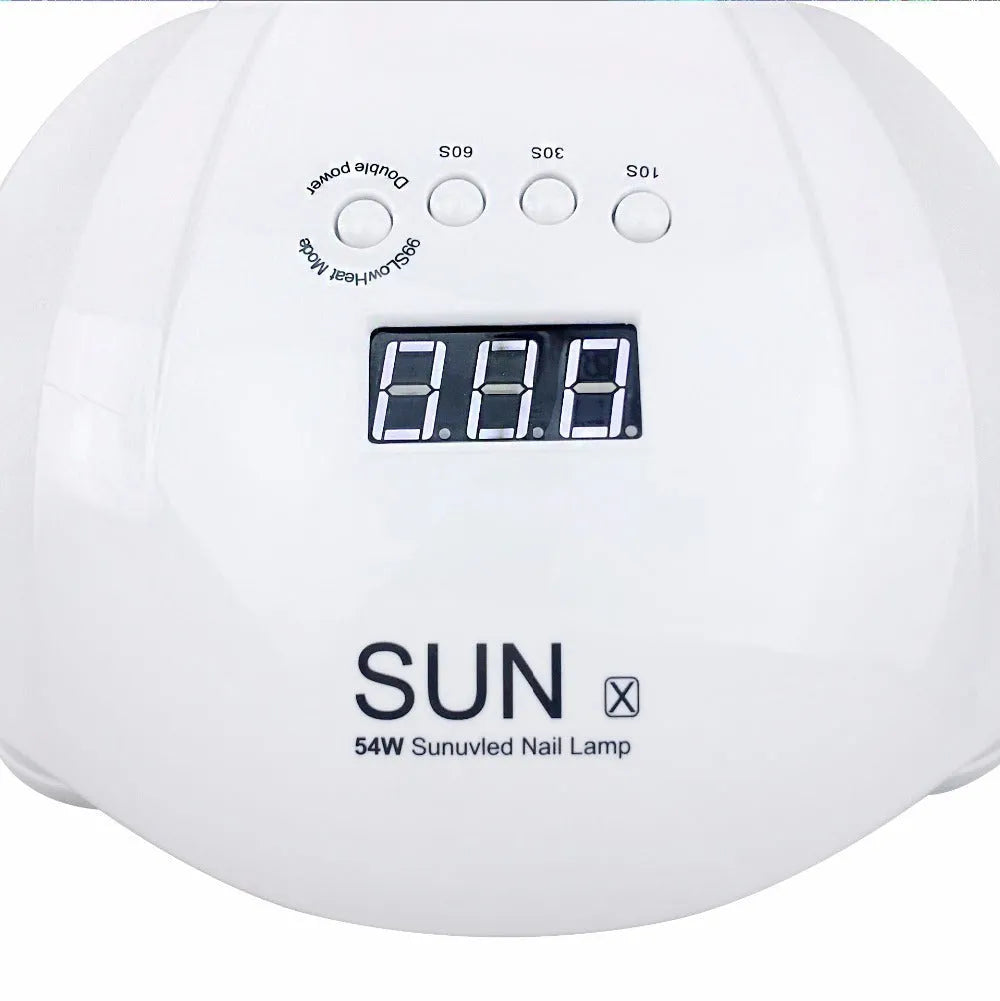 54W UV LED nail lamp dryer with EU plug on white desk, compact design for gel nail curing