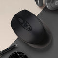 Wireless Bluetooth optical mouse with 1600dpi, four-way scroll wheel, available in five colours, on a desk
