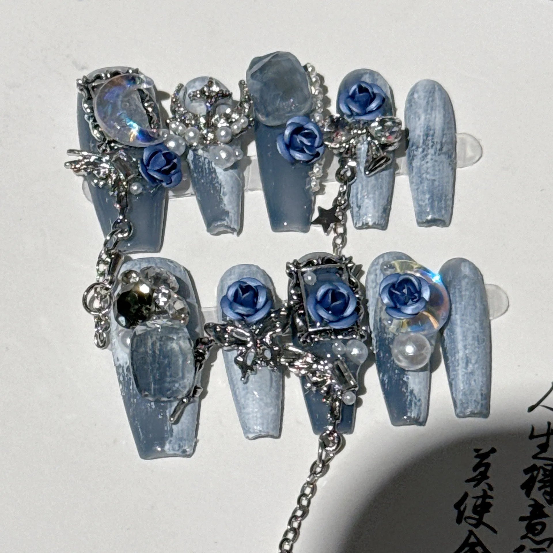 Heavy industry night blue artificial nails with 3D rose and tulip designs, showing sizes XS, S, M, L.