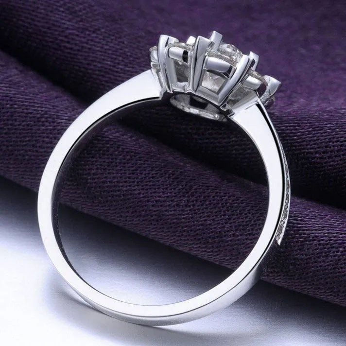 Micro carat diamond and zircon engagement ring set in white gold, available in sizes 16-19