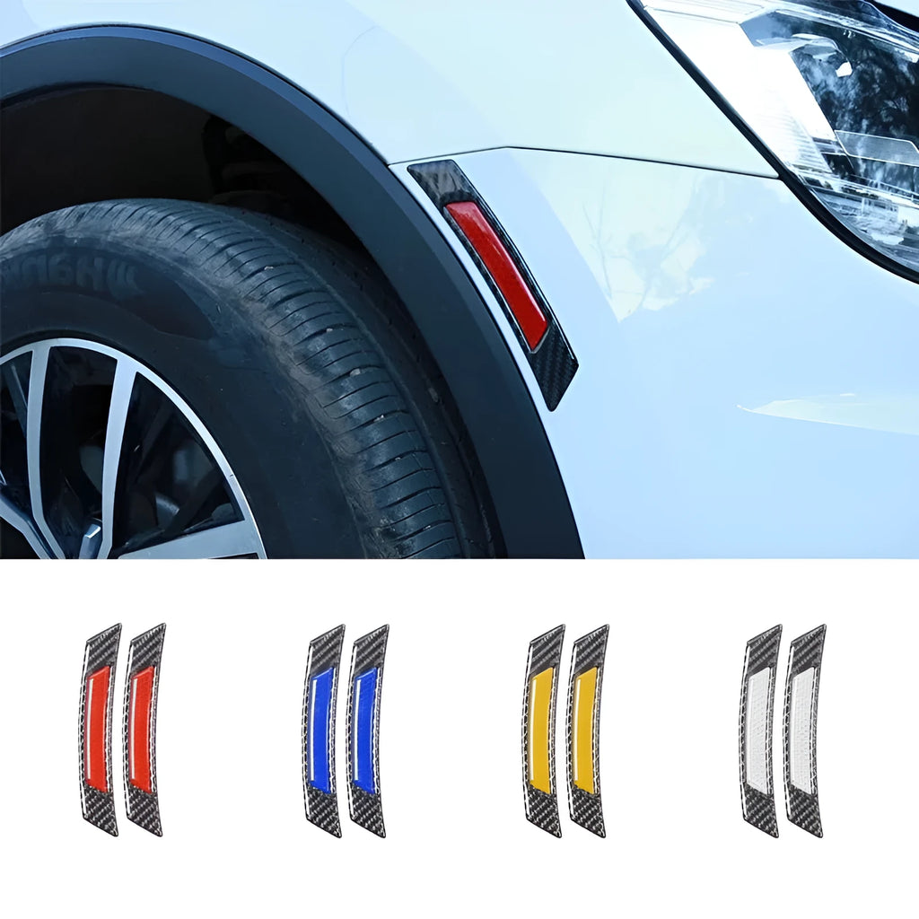 Set of four fluorescent reflective car wheel brow adhesive strips in blue, red, white, and yellow on a black car wheel arch