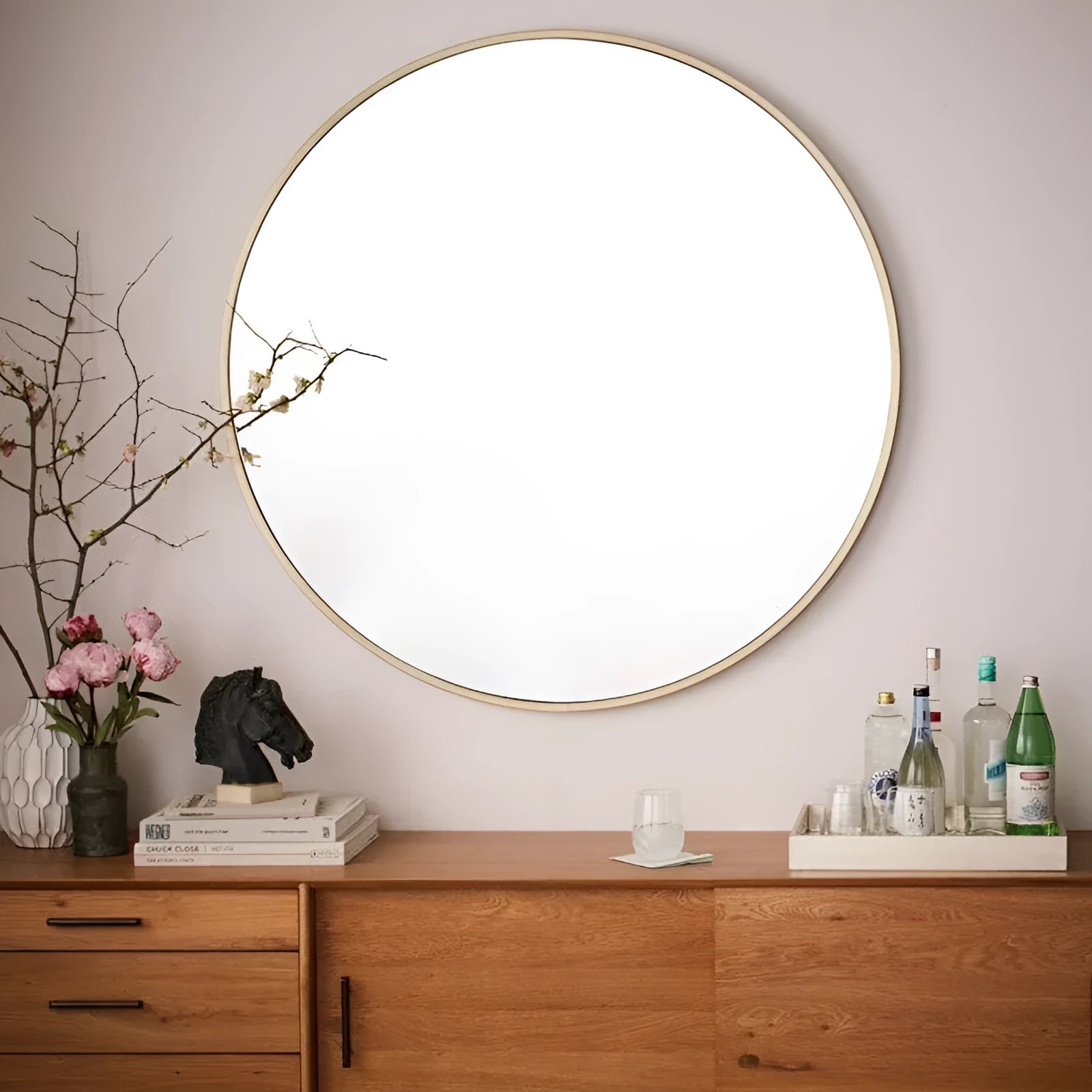 Round Nordic style bathroom wall mirror with iron frame in black, white, or gold colour, 30cm diameter.