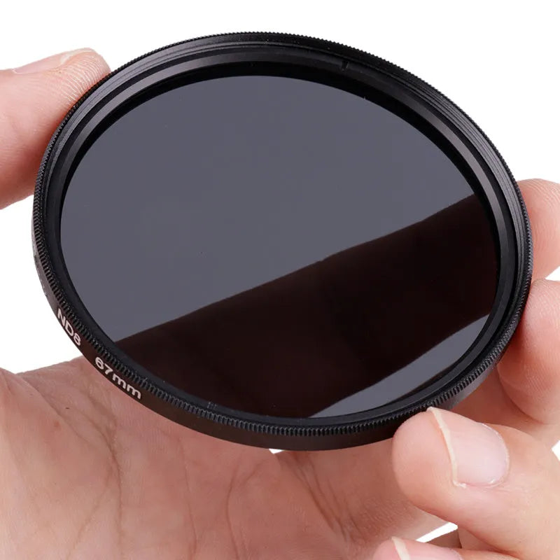 ND8 camera step-up filter in aluminium frame for 49mm to 82mm lenses on a camera lens.