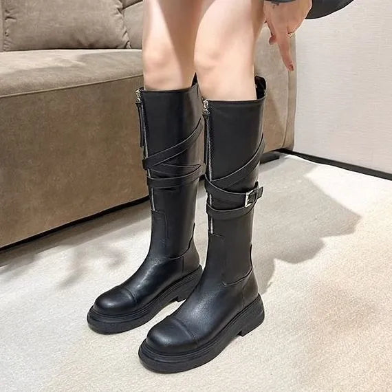Brown women's riding boots with front zipper, mid heel, round toe, and non-slip rubber sole