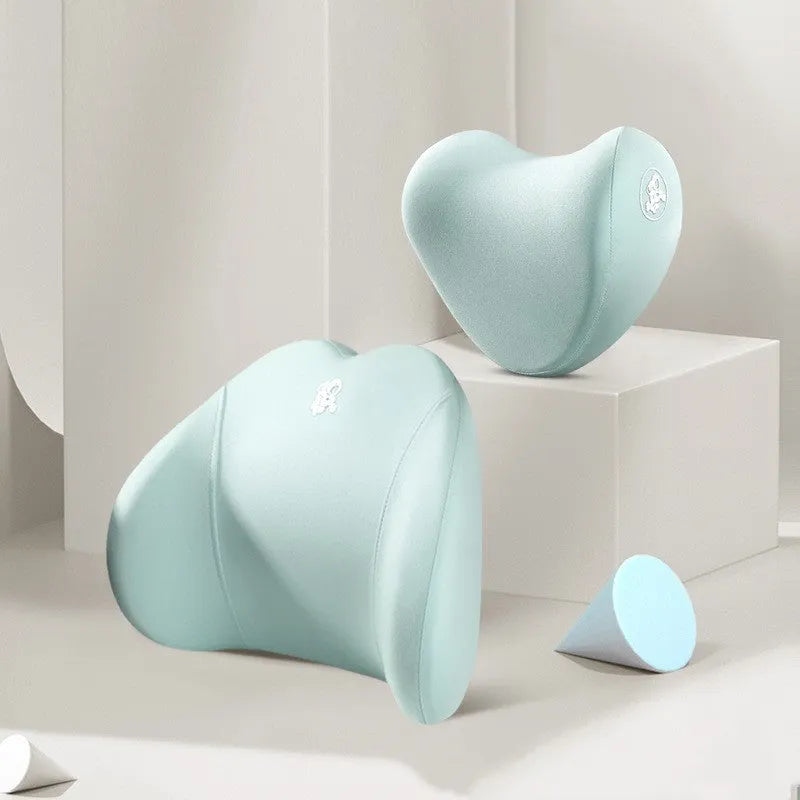 Heart-shaped car pillow set in various colours for lumbar and headrest support.