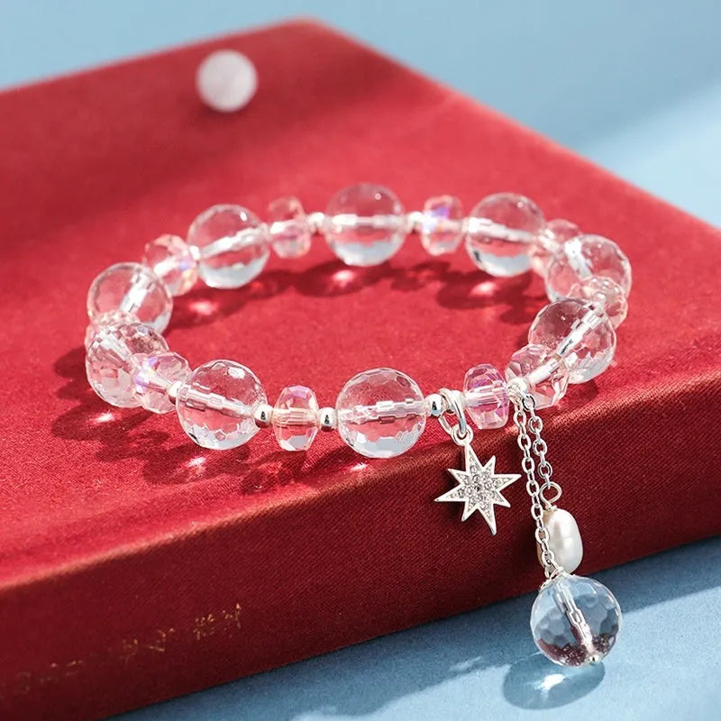 White crystal women's bracelet with diamond-shaped charms and lucky cat element on silver-tone chain
