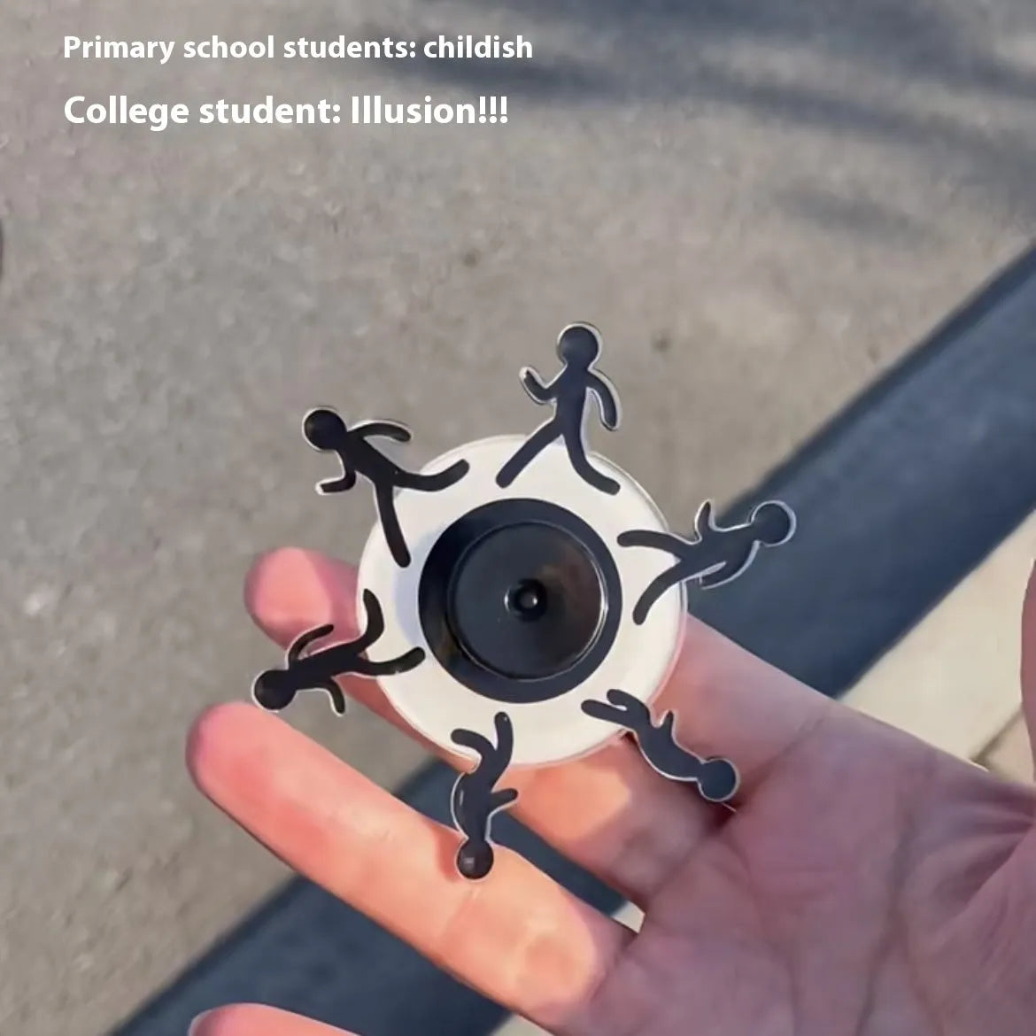 Acrylic stickman running fingertip gyro on finger showing spinning motion