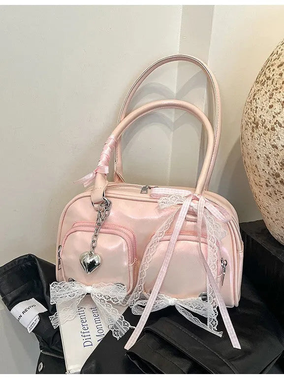 Beige PU shoulder bag with mobile phone pocket and double connector straps on horizontal square suitcase shape