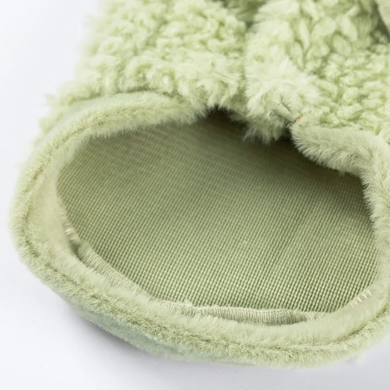 Two-legged sleeveless fleece dog vest with integrated leash ring in soft green or neutral beige, sizes XS to XL