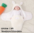 A baby wearing a soft grey fleece sleeping bag with hook-and-loop shoulder straps.