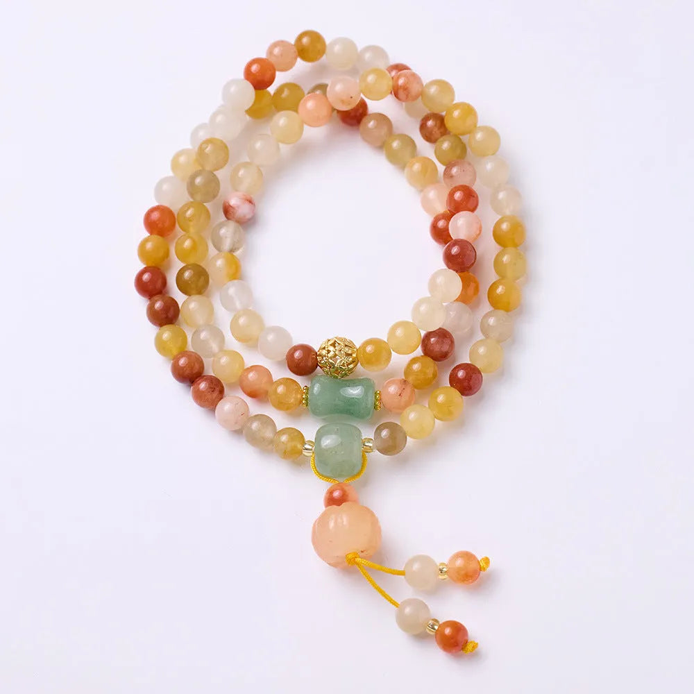 Women's handcrafted three-circle pumpkin jade bracelet with gold tassels